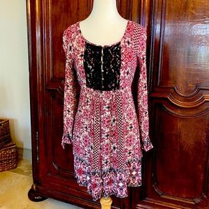 multi red tone print with black trim dress